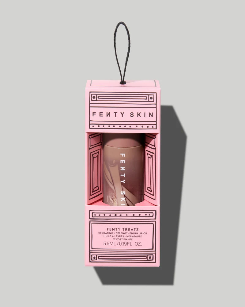 Fenty Beauty  
FENTY TREATZ HYDRATING + STRENGTHENING LIP OIL 
Cinnamon Suger 🍩✔️