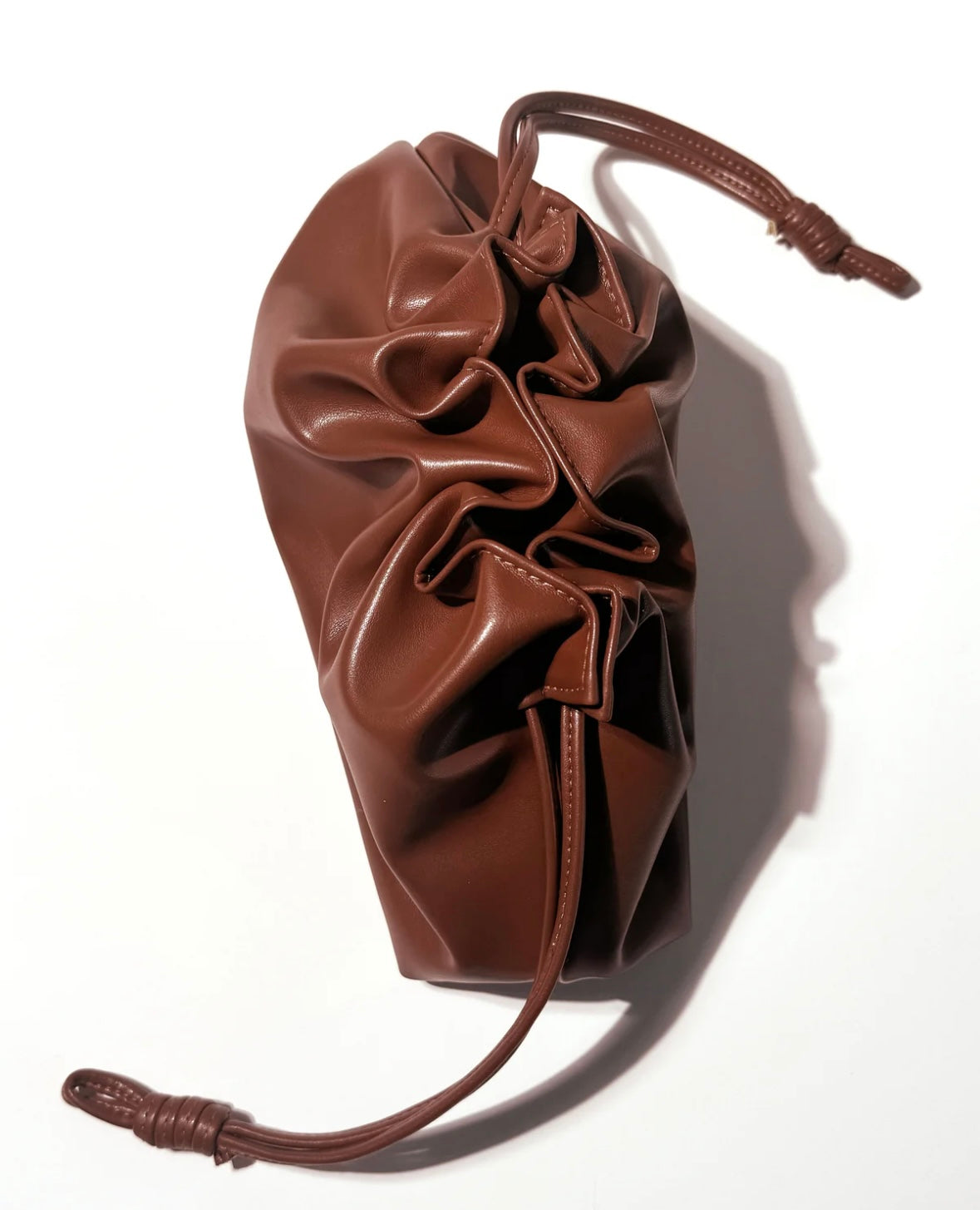 Patrick Ta     
The Elevated Beauty Bag In Brown 🤎