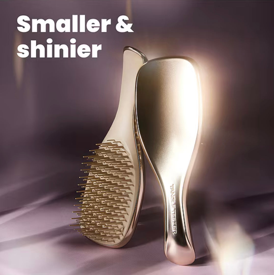 Tangle Teezer 
The Mini Chrome Ultimate Detangler in Champagne Gold 💛
