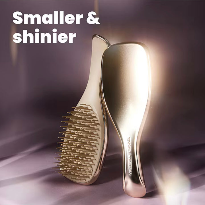 Tangle Teezer 
The Mini Chrome Ultimate Detangler in Champagne Gold 💛