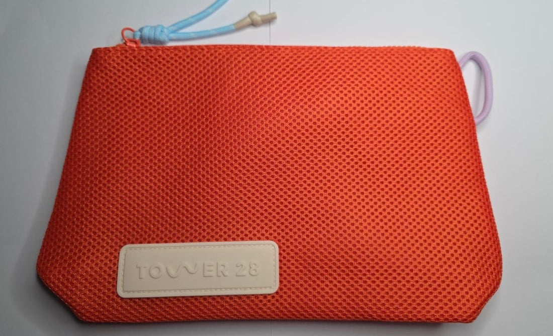 Tower 28 
SOS (Store. Our. Stuff.) Makeup Bag ❤️