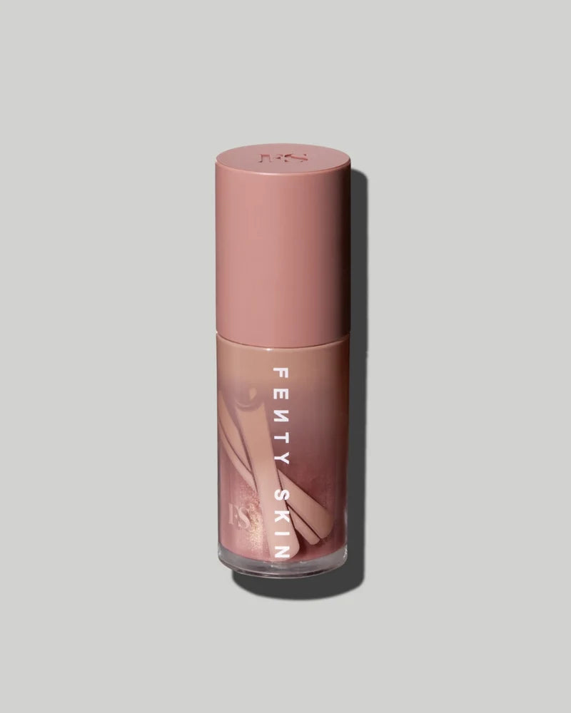 Fenty Beauty  
FENTY TREATZ HYDRATING + STRENGTHENING LIP OIL 
Cinnamon Suger 🍩✔️