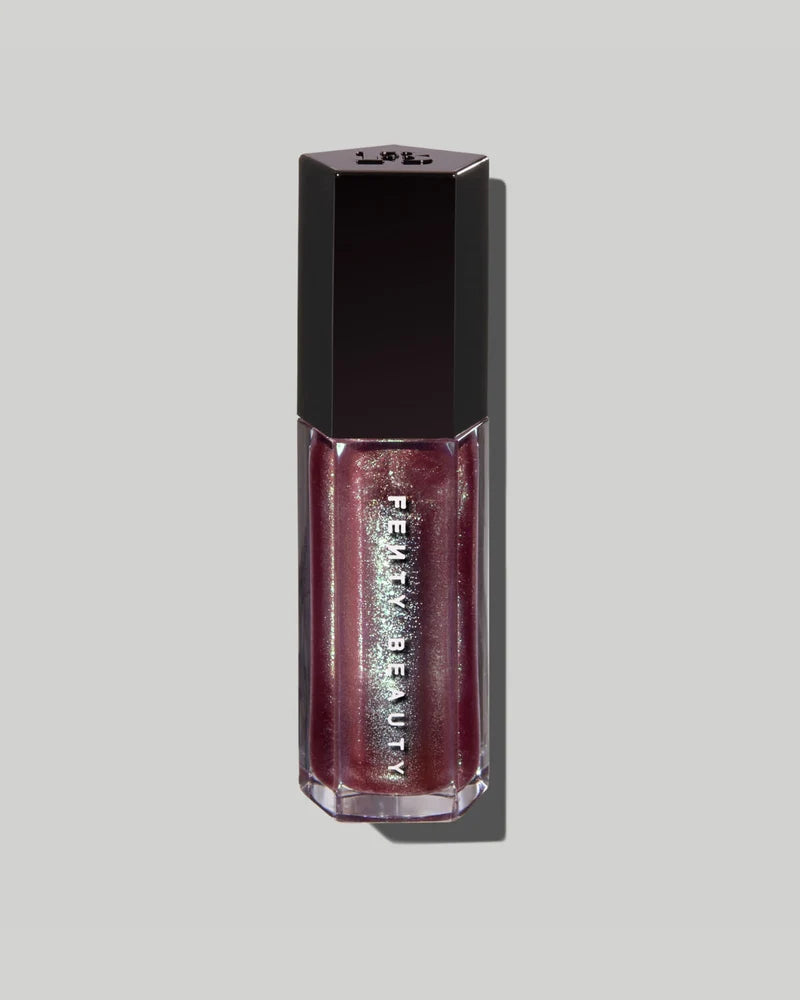 Fenty Beauty    
GLOSS BOMB PRISMATIC LIP LUMINIZER 🤎