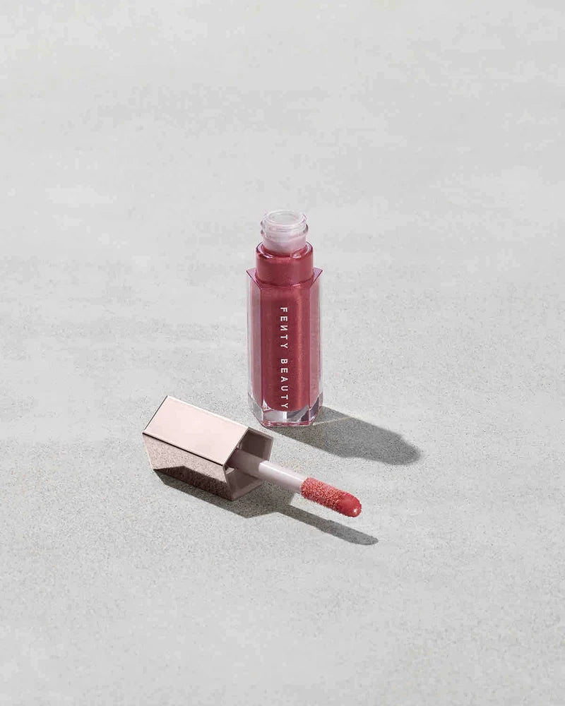Fenty Beauty 
Mini GLOSS BOMB UNIVERSAL LIP LUMINIZER Gloss - Riri 🩷