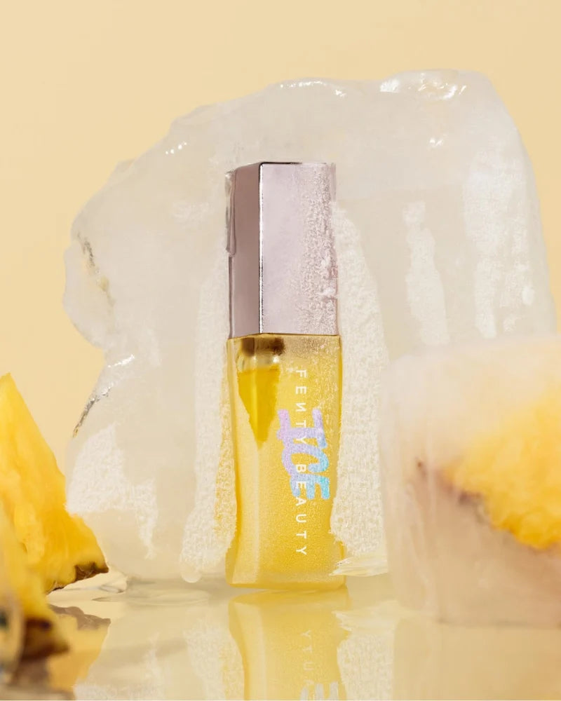 Fenty Beauty  
GLOSS BOMB ICE COOLING LIP LUMINIZER - Ice’d Pineapple 🍍