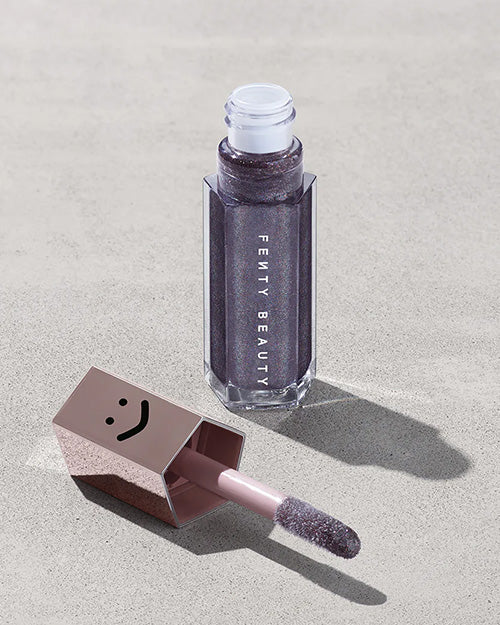Fenty Beauty   
GLOSS BOMB UNIVERSAL LIP LUMINIZER - Major Flex 🖤