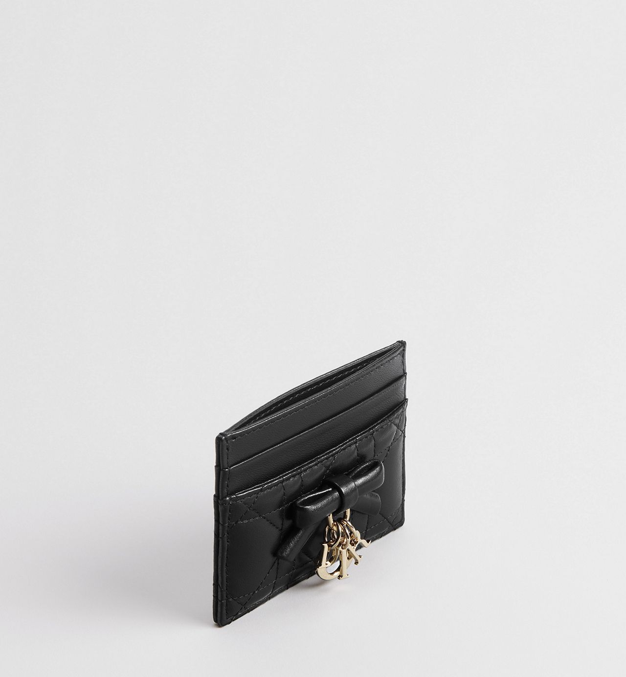 Dior 
Lady Dior Freesia Card Holder 🖤