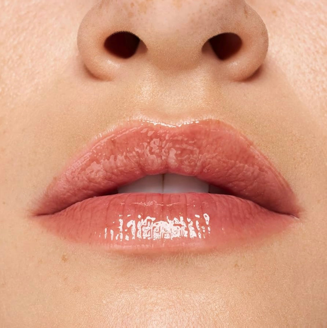 Essence       
CHOCO BOMB Shiny Lip Gloss 🤎