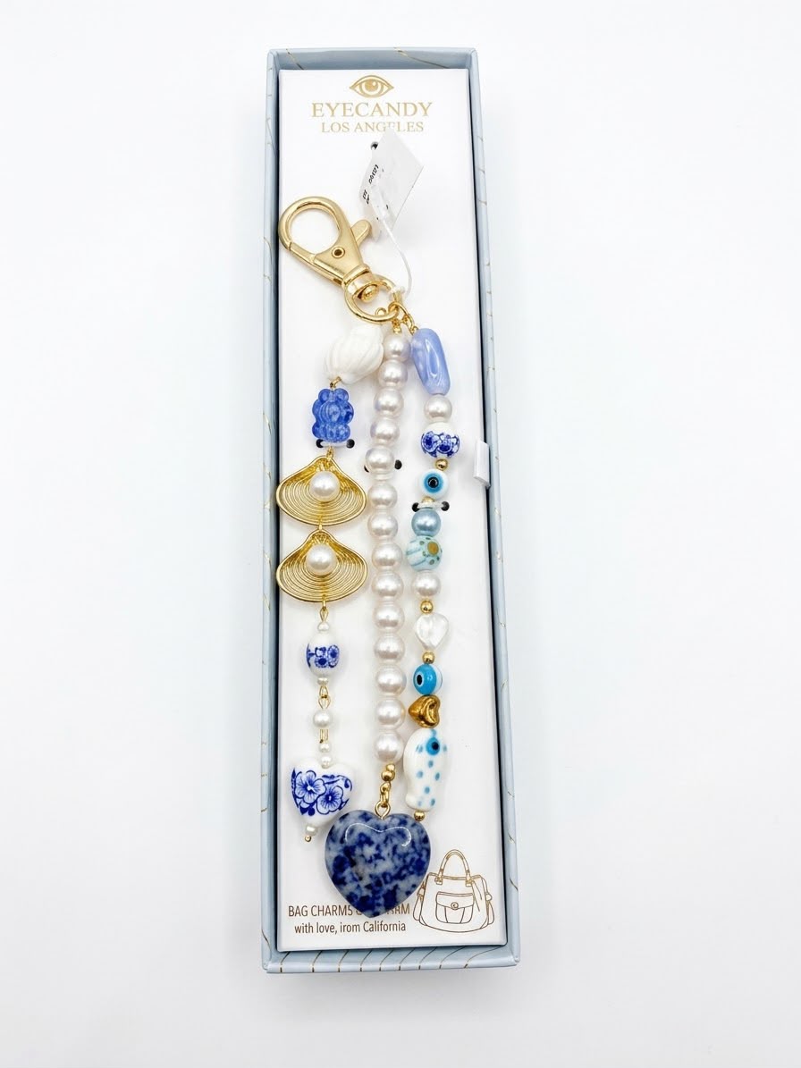 Eye Candy   
gold plated blue turquoise stones and pearls bag charm and keycharm 🩵