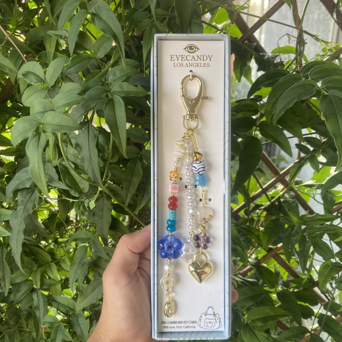 Eye Candy   
Gold, Blue & Pink Beaded Heart Key Bag Charm 💙