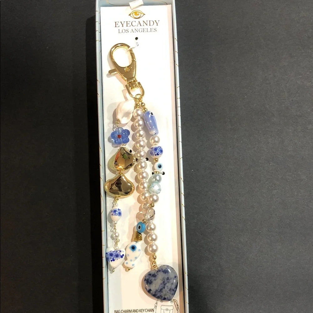 Eye Candy   
gold plated blue turquoise stones and pearls bag charm and keycharm 🩵