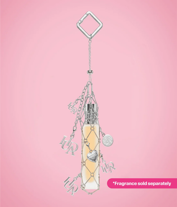 HUDA BEAUTY TRAVEL SPRAY FRAGRANCE HOLDER WITH CHARMS
