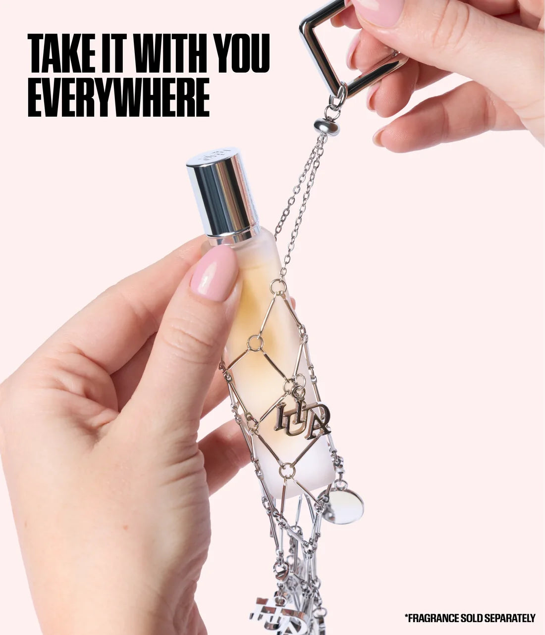HUDA BEAUTY TRAVEL SPRAY FRAGRANCE HOLDER WITH CHARMS