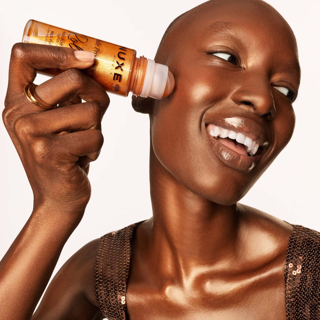 NUXE     
Huile Prodigieuse Or Roll-On 🧡